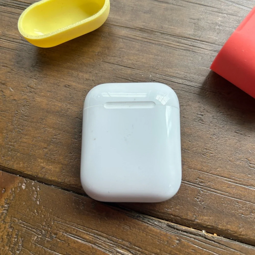 AirPods with Red and Yellow Case - Picture 4 of 7